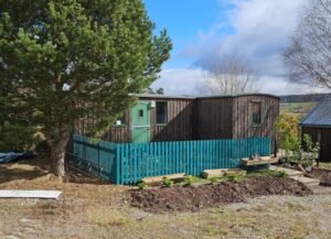 Bespoke shepherd’s huts combined into one unit in Inverness, Scotland.