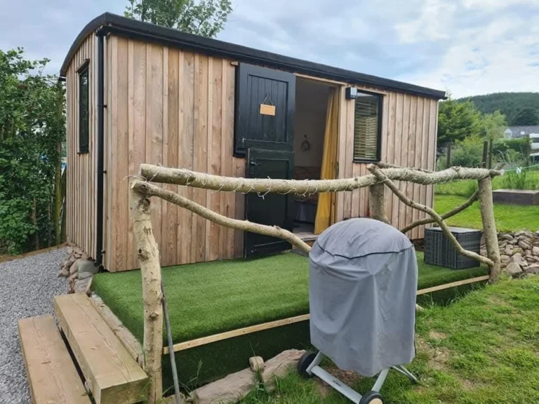 Custom-built shepherd’s hut in Dumfries, Scotland, set within a private garden.