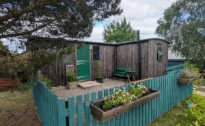 Brambles shepherds hut green fence
