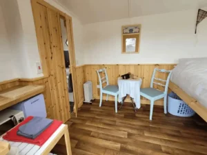 Christie shepherds hut bedroom dining area