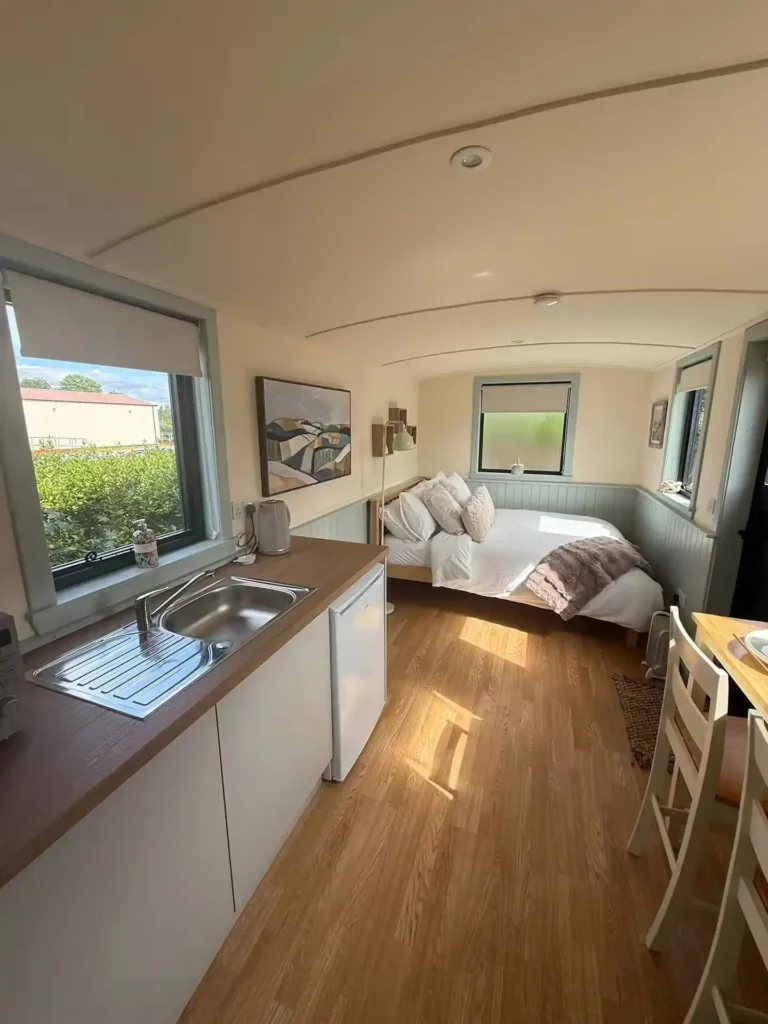 Furnished shepherds hut kitchen bed