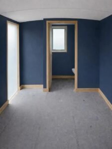 Navy painted shepherds hut interior