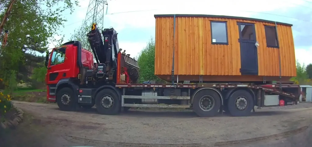 Shepherds hut hiab lorry delivery